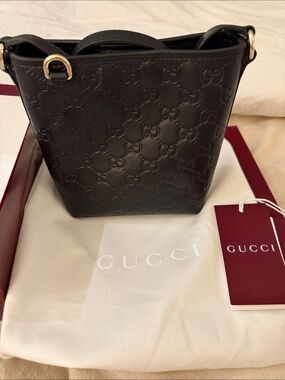 2025 Gucci GG Embossed Leather Mini Bucket Bag Black Crossbody, Box & Dust Bag